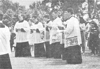 Priests watching crowning