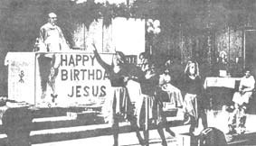 Four girls dancing before the sanctuary