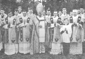 Group photo of Archbishop Lefebvre with the newly ordained deacons and subdeacons