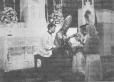Archbishop Lefebvre administers the Sacrament of Confirmation