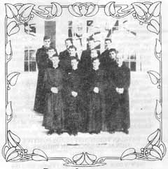 Twelve Seminarians in Cassocks