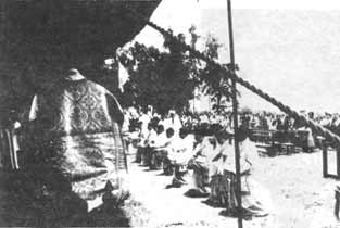 Mgr. de Castro Mayer approaching the line of eight ordinands