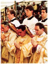 Gospels laid on shoulders of candidates