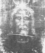 The Holy Face of Jesus, as it appears on the Shroud of Turin