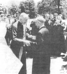 Archbishop Marcel Lefebvre meets with Bishop Antonio de Castro Mayer, along with several priests