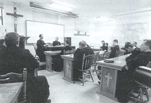 Fr. Couture with Bishop Manat as conference