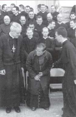 Bishop Williamson, Bishop Manat and Fr. Couture with other priests of the SSPX