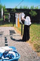nun hanging laundry