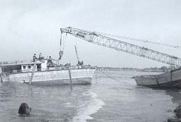 crane lifting boat