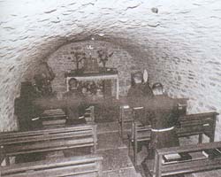 mass in a grotto